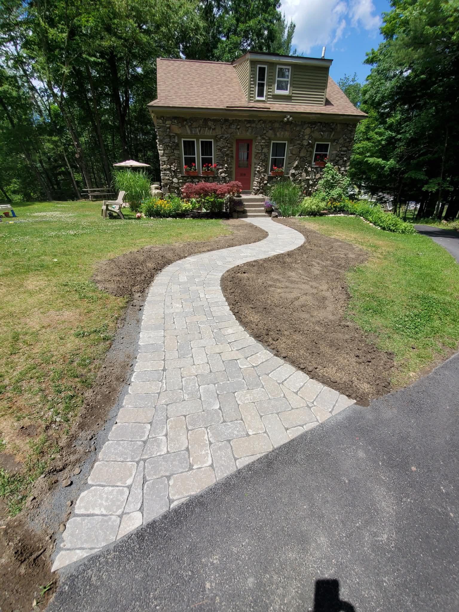Curved stone walkway at cottage — finished