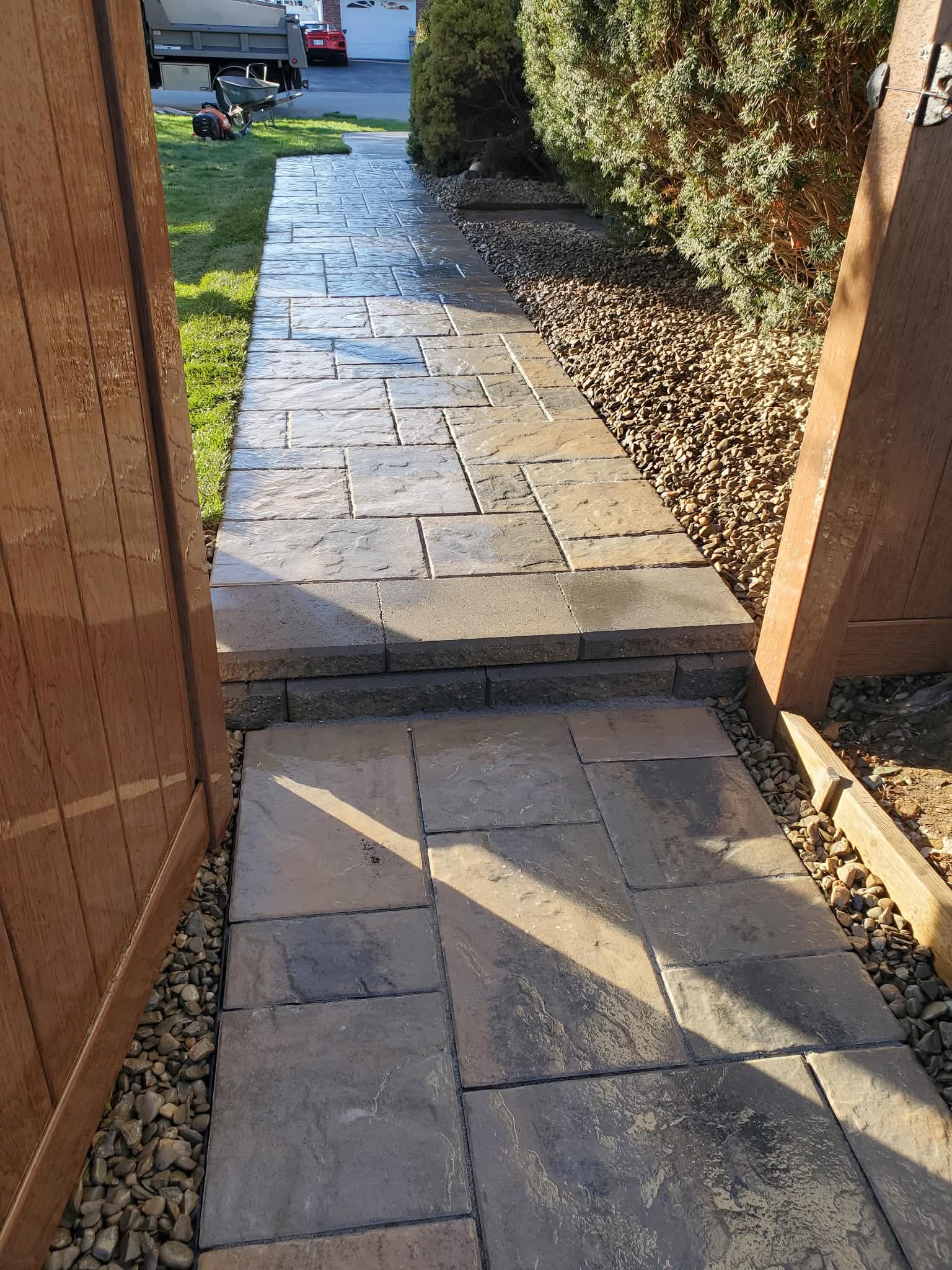Slate walkway between fences — close up